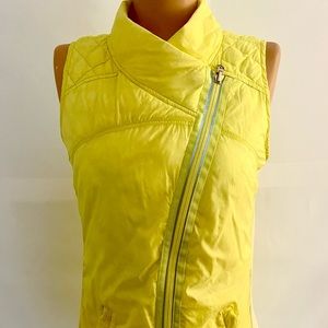 LULULEMON “what the fluff” vibrant neon yellow zip vest.